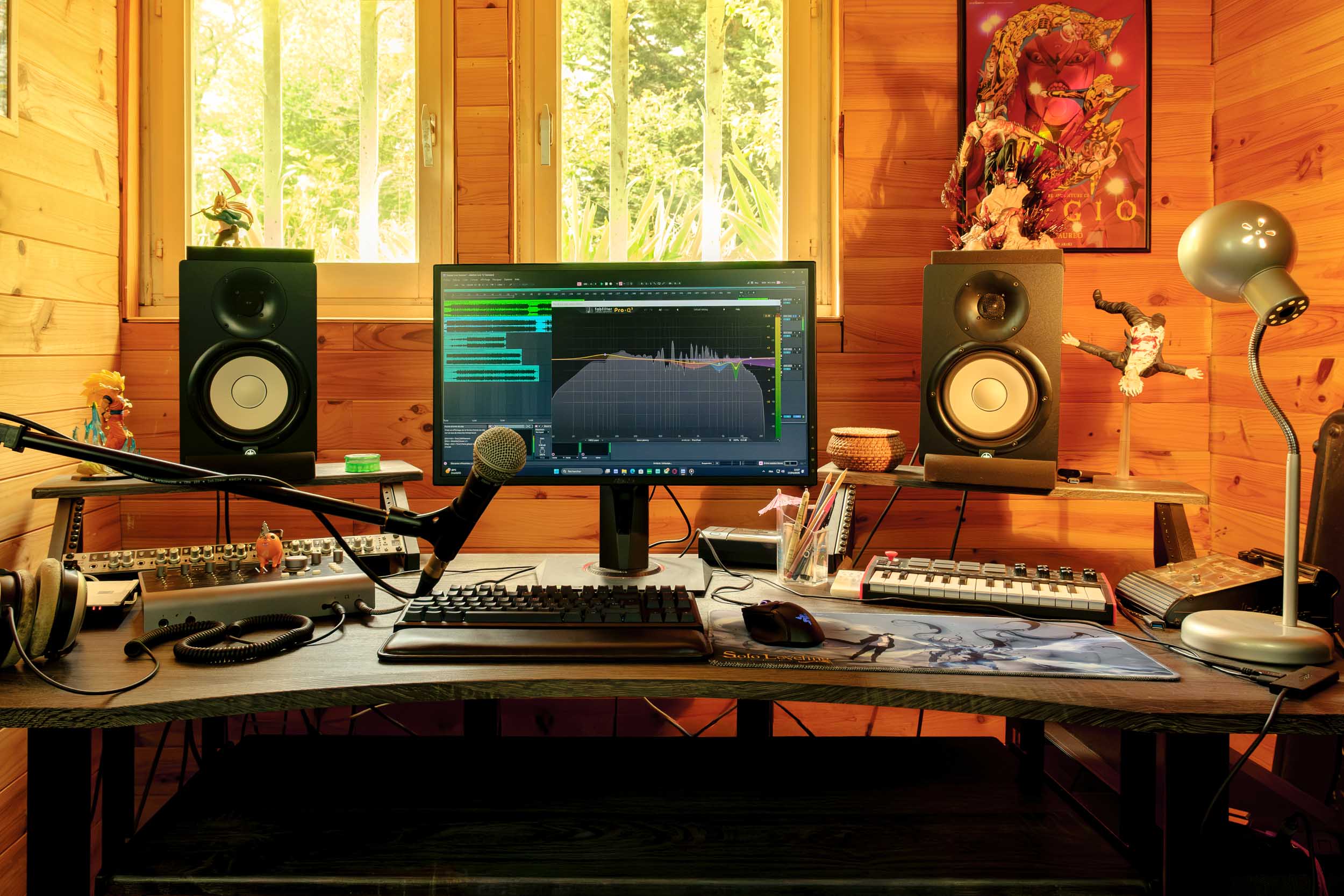 desk and monitors with the Pyrenees in the window